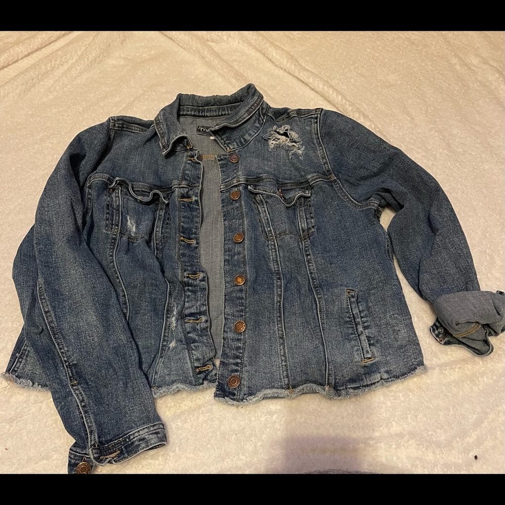Distressed jean jacket